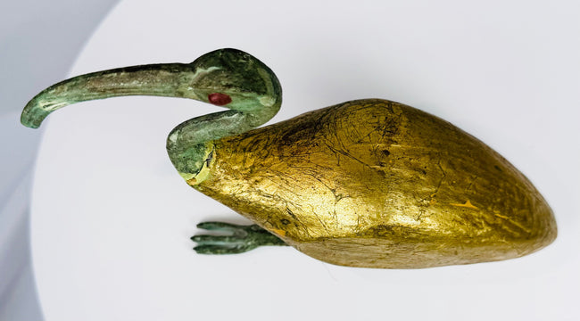 Vintage Egyptian Revival ibis sculpture with verdigris patina, gilt surface treatment, and elegant stylized form.
