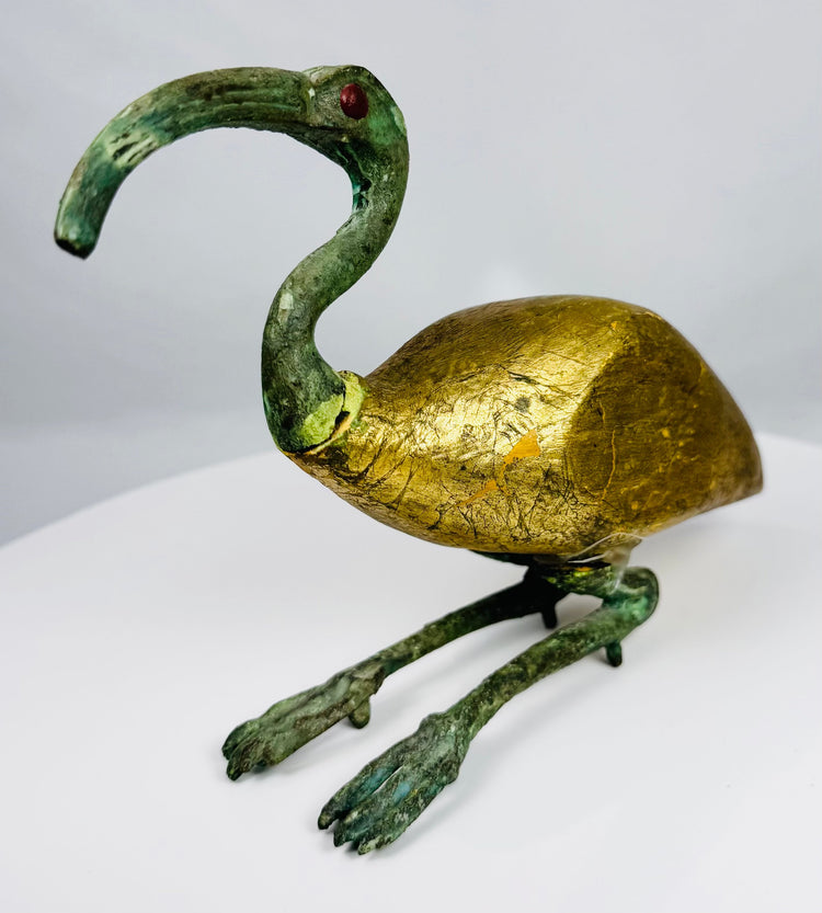 Decorative Egyptian Revival mixed-media sculpture inspired by the sacred ibis of ancient Egypt.