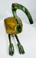 Vintage sacred ibis sculpture inspired by ancient Egyptian art with a textured gold-colored body and patinated neck.