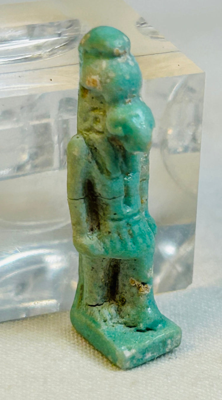 Ancient Egyptian blue-green faience falcon-headed amulet of Horus with burial patina