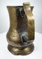 English 18th-century brass ale tankard showing traditional Georgian craftsmanship, cylindrical body, and decorative footed base.