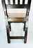 High back English oak chair with narrow vertical slats and aged patina