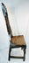 Antique English oak chair with two plank seat and turned front stretcher detail