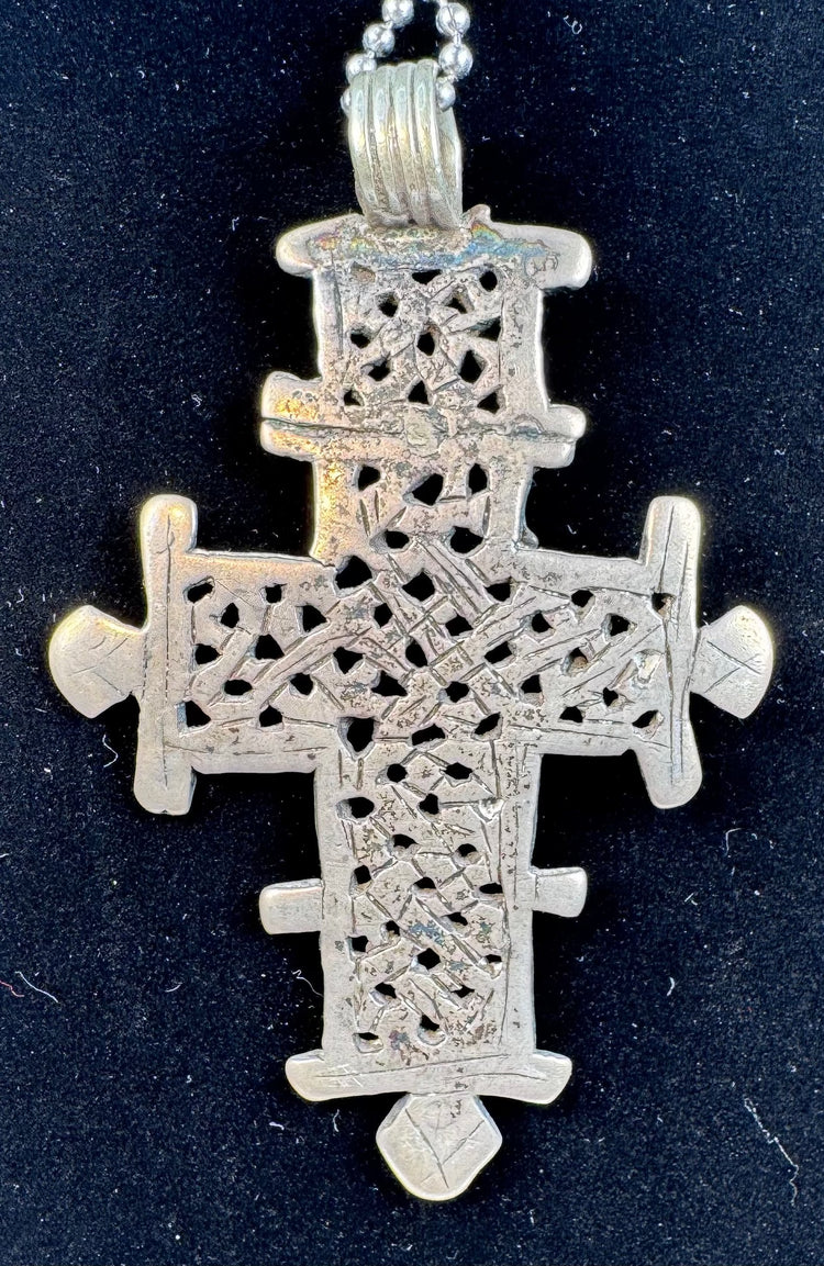 Authentic vintage Ethiopian devotional cross representing the rich traditions of Ethiopian Orthodox Christianity.