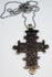 Vintage Ethiopian Christian cross in silver-tone metal displaying traditional Orthodox openwork design.