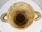 Ancient Etruscan cup with geometric motifs and archaeological wear