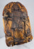 Antique European saint carving showing extensive age-related erosion, cracking, and surface losses