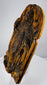Detailed view of the small attendant or symbolic animal beside the unidentified standing saint