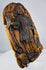 Lower section of a hand-carved devotional panel with worn robes and deeply carved cloudlike decoration