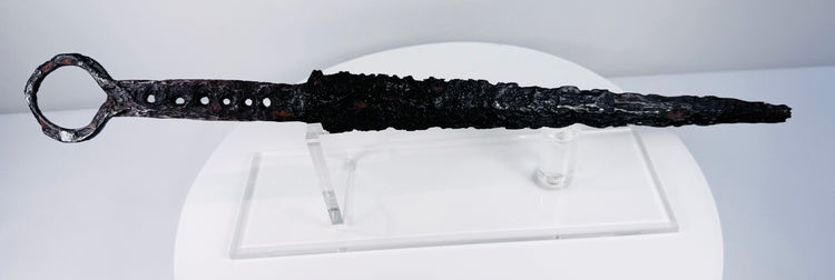 Antique medieval quillon dagger with tapered thrusting blade and distinctive circular ring pommel