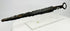 Medieval European dagger with ring pommel and corroded forged steel blade on acrylic display stand — 14th-century weapon artifact photographed on white background.