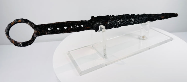 Rare medieval European dagger with forged blade, pierced grip section and circular iron pommel