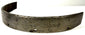 Close-up of 17th-century defensive steel band with pitted surface and squared ends