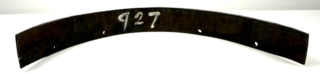 Reverse side of antique steel armor band marked with inventory number 927 and rivet holes