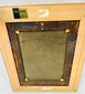 Back of antique religious oil painting with Allen Gallery label and aged wooden frame details.