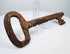 Antique European skeleton key from the 1700s featuring a wedge-shaped ward and hand-forged iron construction.