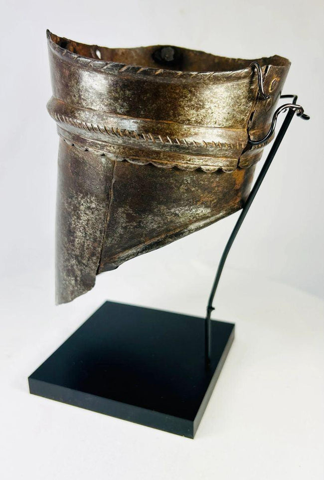 Antique European arm defense plate, cylindrical form with rivet holes and mid-band incising, circa 1500s armor fragment.