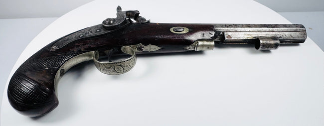Antique English percussion pistol displayed from the side showing full 14-inch profile