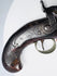 Detailed view of checkered walnut grip on Fenton of London 19th-century percussion pistol