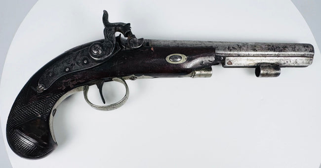 Full-length view of antique Fenton London percussion pistol with engraved steel and walnut construction