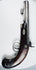 Top view of antique Fenton percussion pistol showing octagonal barrel and engraved steel fittings