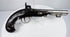 19th-century London percussion pistol with ornate engraved hardware and aged steel patina