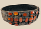 Ornate Southern Russian bridal belt, 17th–18th century, crafted with riveted brass plates and inlaid with vibrant Cornelian stones, used in Jewish wedding ceremonies.