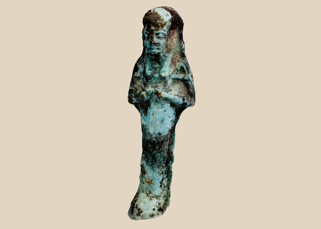 Ancient Egyptian blue-green faience ushabti figure circa 600–30 BCE