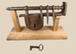 Antique 18th-century European wrought-iron sliding hasp gate lock with original-style key