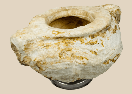 Ancient Middle Eastern carved white stone vessel with opposing lugs