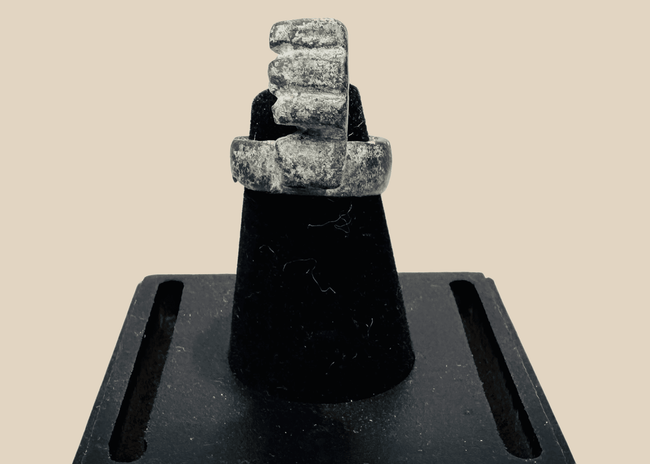 Ancient Roman bronze ring key from the 3rd–4th century CE with an integral toothed key bit and green-brown patina