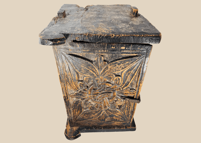 Antique South Asian carved wooden chest with floral panel and iron latc