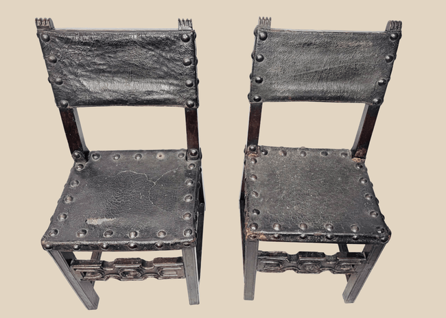 Pair of 17th-century Spanish Baroque walnut side chairs with leather upholstery