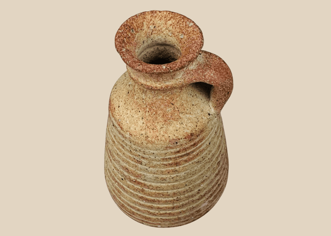 Ancient Roman terracotta juglet with loop handle and flared rim, circa 2nd–5th century CE