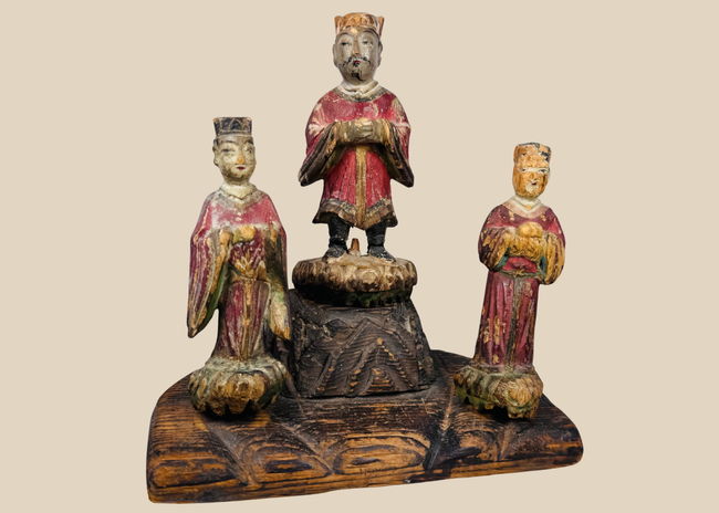Antique Chinese polychrome wooden shrine group with a central official and two smaller attendants