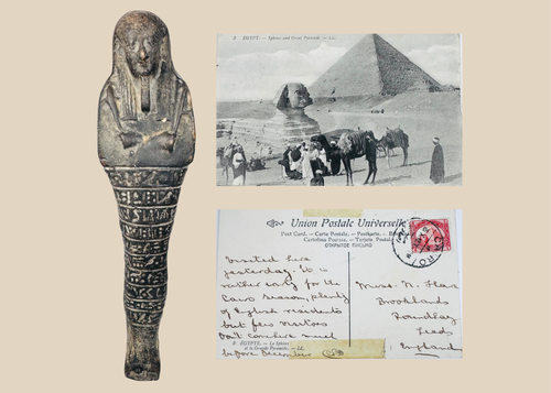 Ancient Egyptian dark stone ushabti displayed with the front and handwritten reverse of an early 20th-century Cairo postcard