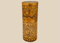 Antique carved bamboo container from Island Southeast Asia, 19th century, cylindrical with fitted lid and base, decorated with incised geometric patterns darkened with pigment, traditionally used for betel nut lime storage, photographed on a white background.