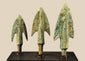 Frontal view of varying sized bronze projectiles with heavy oxidation