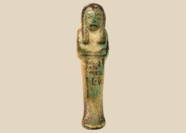Ancient Egyptian blue-green faience ushabti funerary figure dating to the Third Intermediate Period, circa 1070–715 BCE.