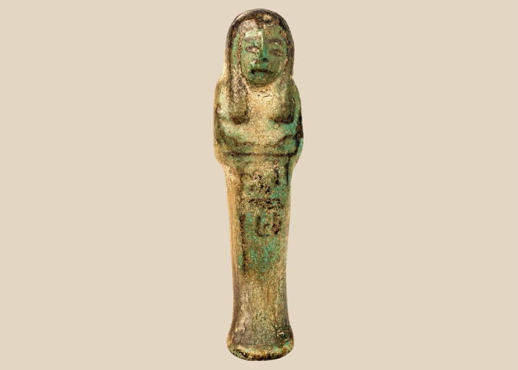 Ancient Egyptian blue-green faience ushabti funerary figure dating to the Third Intermediate Period, circa 1070–715 BCE.