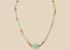 Ancient Egyptian Eye of Horus faience necklace with turquoise-green tubular beads and earthy brown spacer beads, circa 664–30 BCE.