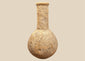 Ancient Roman stone unguentarium, circa 1st–3rd century CE, featuring a rounded bulbous body, elongated cylindrical neck, and thick projecting rim.