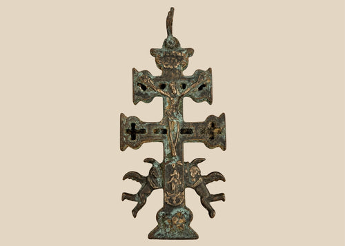 Antique Spanish bronze Cross of Caravaca, circa 17th century, featuring a double-barred crucifix, winged angels, and intricate religious imagery.