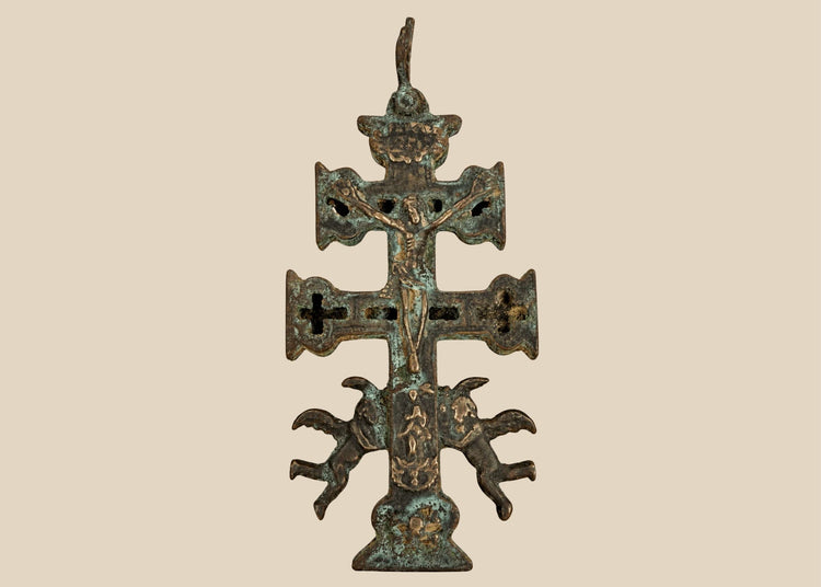 Antique Spanish bronze Cross of Caravaca, circa 17th century, featuring a double-barred crucifix, winged angels, and intricate religious imagery.