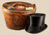 Antique British black silk top hat by Scott & Co. of London, accompanied by its original brown leather travelling case.