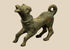 Ancient Roman bronze barking dog figurine dating to the 1st century BCE–3rd century CE, featuring an open mouth and curled tail.
