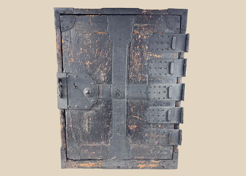 Antique Japanese Edo period funa tansu ship chest circa 1780 with black kiri wood body and extensive hand-forged iron fittings