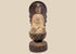 Antique Chinese Guanyin statue from the Late Ming to Early Qing Dynasty with giltwood surface, red pigment and carved lotus pedestal