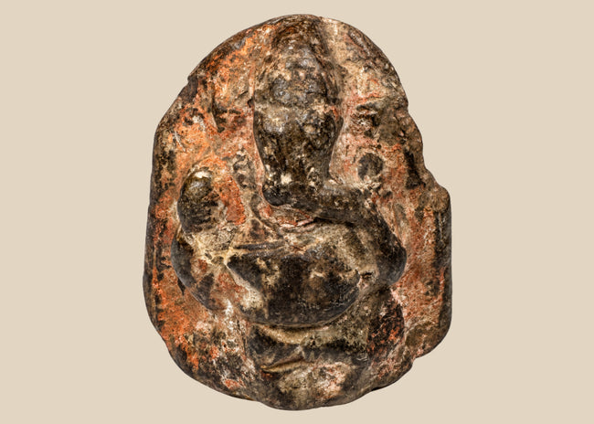 South Indian sandstone Ganesha votive sculpture with traces of pink and reddish pigment, 18th–19th century