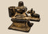 Antique 19th century Indian brass Shiva Lingam and Nandi miniature devotional shrine with aged dark patina.
